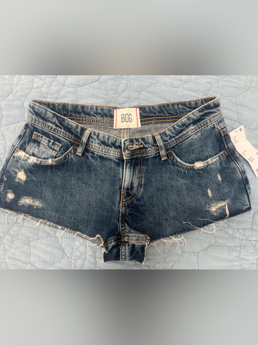 BDG Dark Blue Distressed Denim Shorts from Urban Outfitters